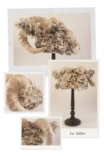 Postiche de bélier posé sur son socle en bois. Postiche "Le bélier"