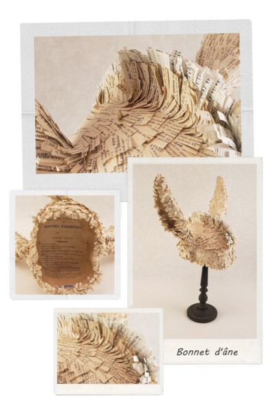 Bonnet d'âne posé sur son socle en bois. Postiche "bonnet d'âne"